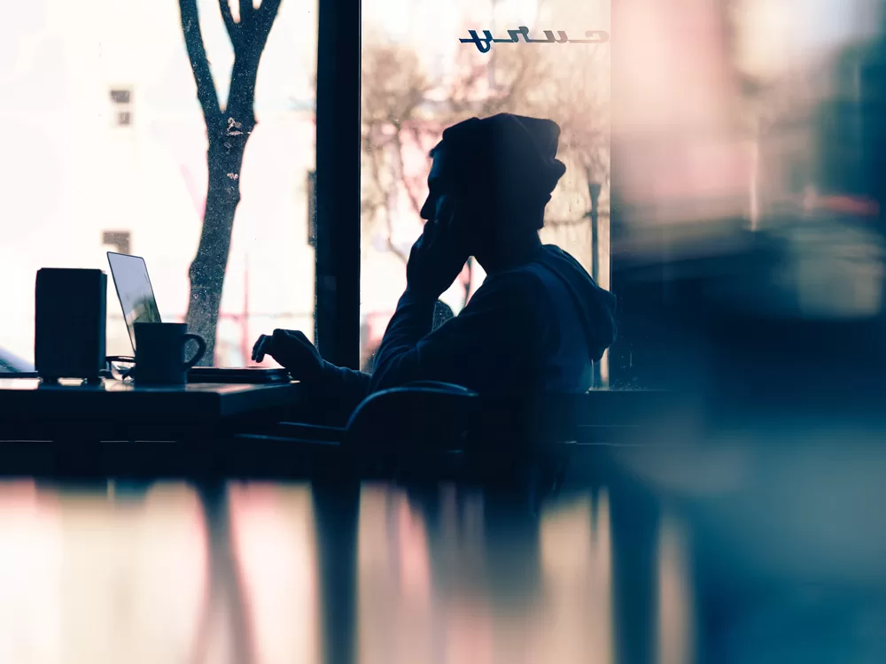 Jewish Man learning Torah Remotely